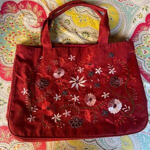Beautiful large burgundy red colored bag with beading and embroidery detail